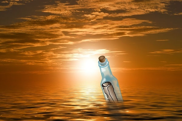 ocean with message in a bottle
