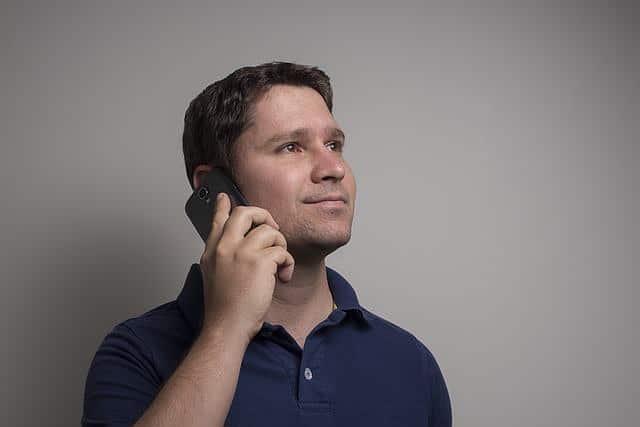 Male customer receiving a call.